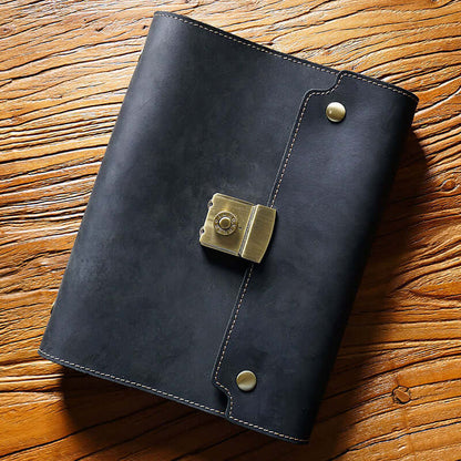 Refillable Leather Planner A5 With Lock Business Organizer 9in in black leather on wooden surface.