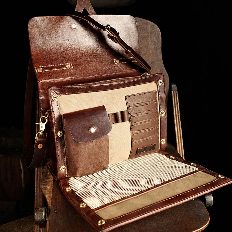 Interior view of a Handmade Italian Leather Laptop Bag Men showcasing pockets and compartments.
