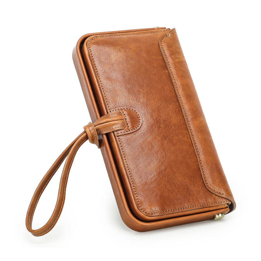 Leather Wristlet Wallet Women Clutch Metal Frame Phone Holder Purse in brown top-grain cowhide with wrist strap.