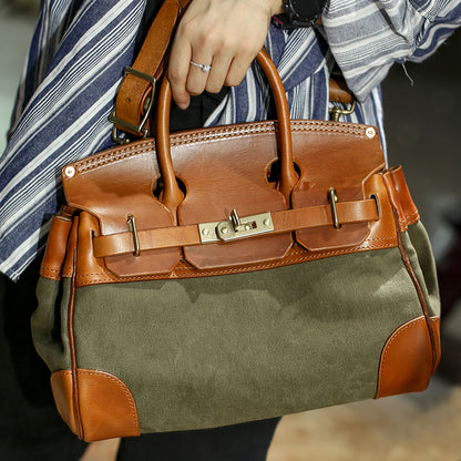 Leather Canvas Crossbody Bag featuring brown leather handles and olive green canvas body, perfect for women.