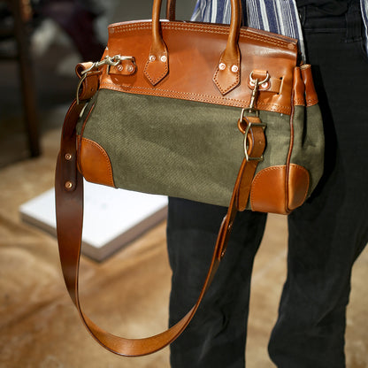 Leather Canvas Crossbody Bag in olive and brown, featuring stylish design and sturdy handles.