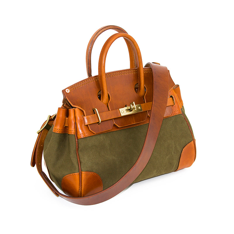 Leather Canvas Crossbody Bag showcasing a stylish design with leather and canvas materials, featuring dual handles and a long strap.