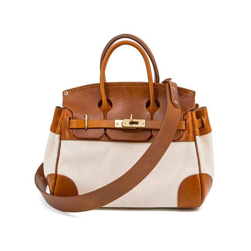 Leather Canvas Crossbody Bag with brown leather accents and a detachable shoulder strap, ideal for everyday use.