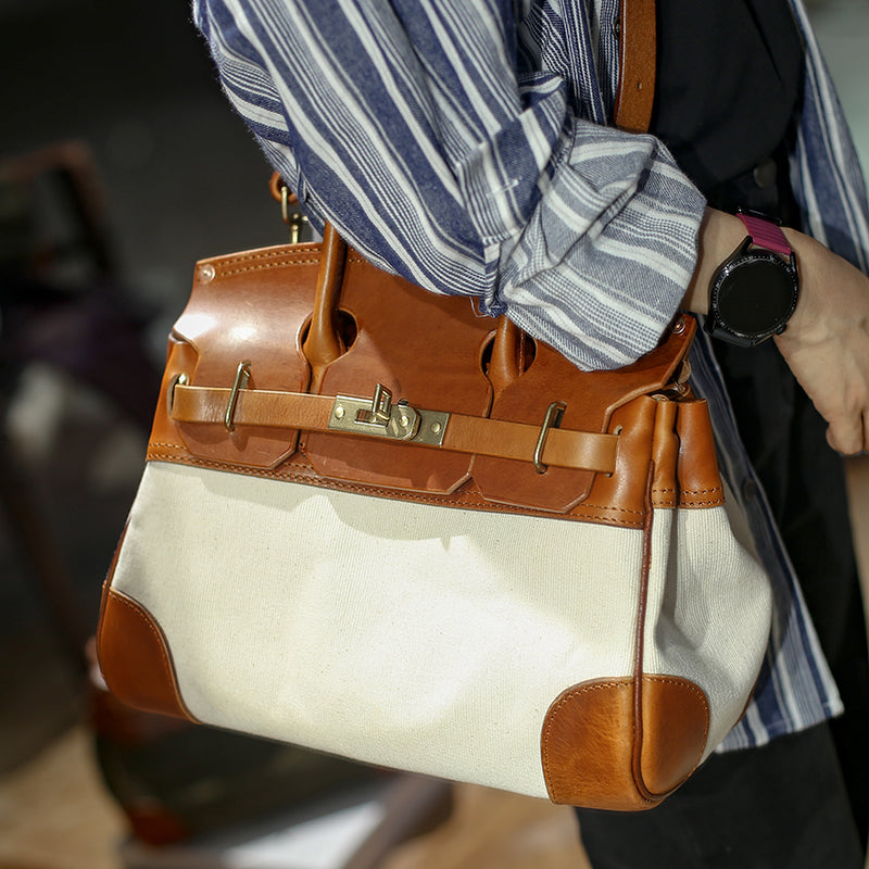 Leather Canvas Crossbody Bag displayed on a person, showcasing its stylish design and functionality.