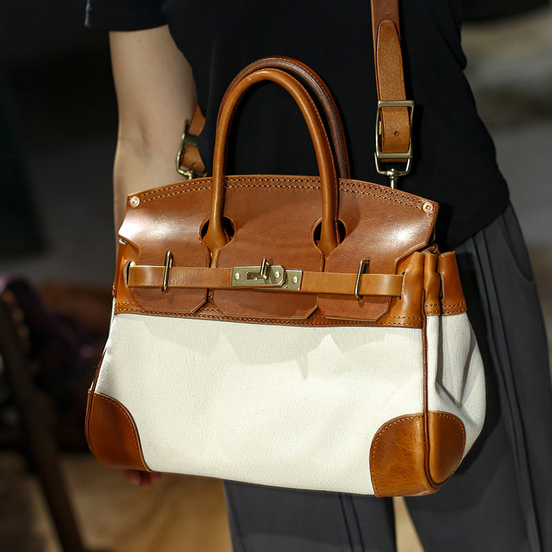 Leather Canvas Crossbody Bag with brown leather accents and handles, perfect for women's fashion.