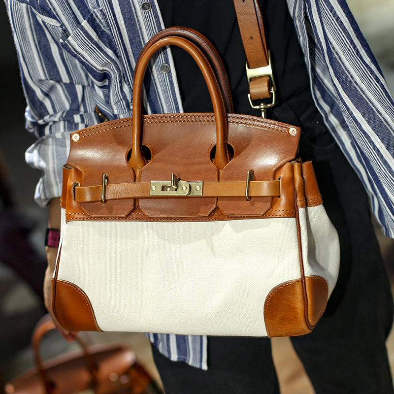 Leather Canvas Crossbody Bag featuring a stylish design with leather handles and a beige canvas body