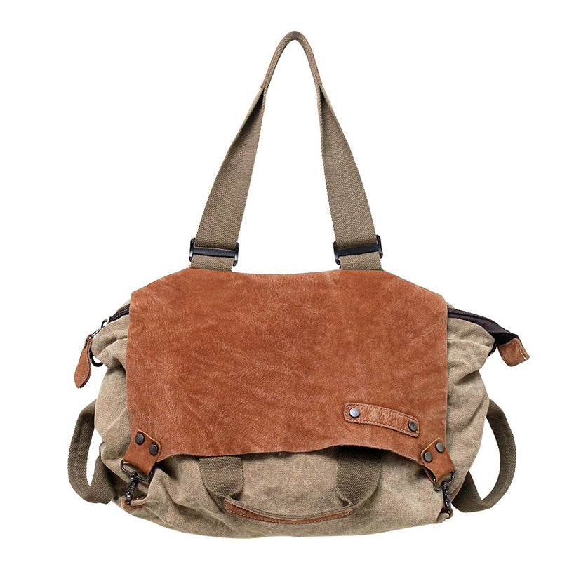 Soft leather canvas weekend bag for women, featuring a distressed top-grain leather flap and large tote style.