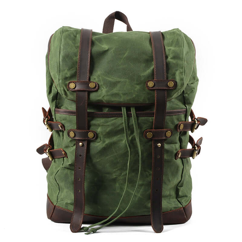 Canvas Backpack Men Waterproof Travel Rucksack Outdoor Bag 17.7in in green color with leather accents.