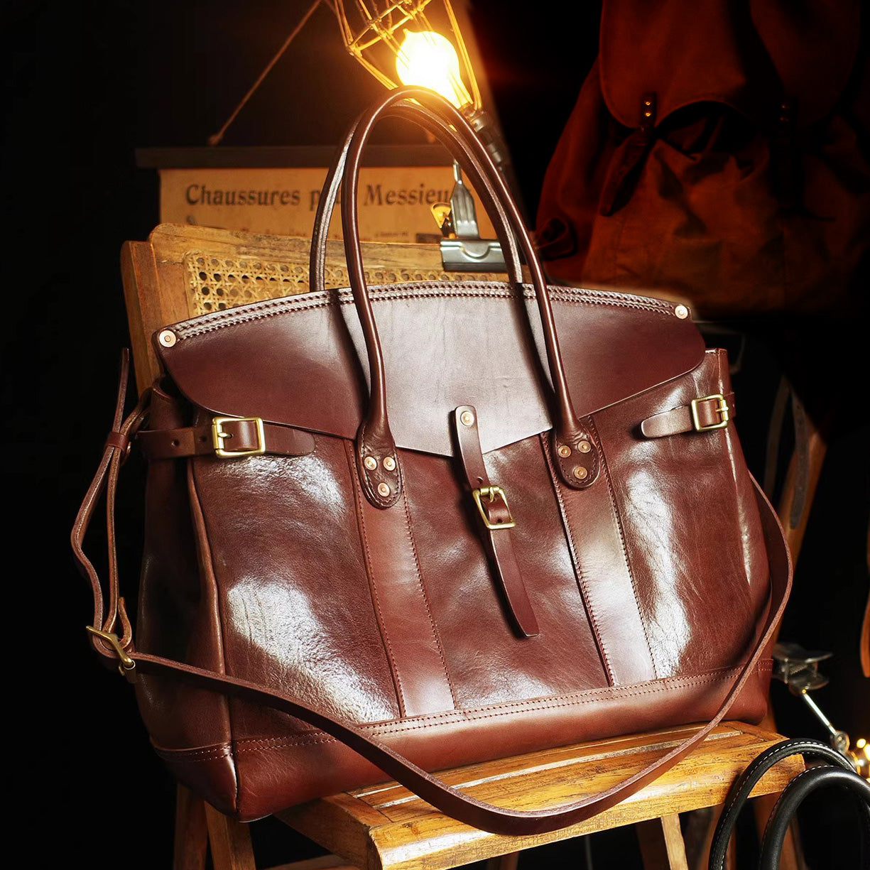 Stylish Italian Leather Travel Bag, perfect for laptops and weekend trips, showcasing premium craftsmanship and a rich brown finish.