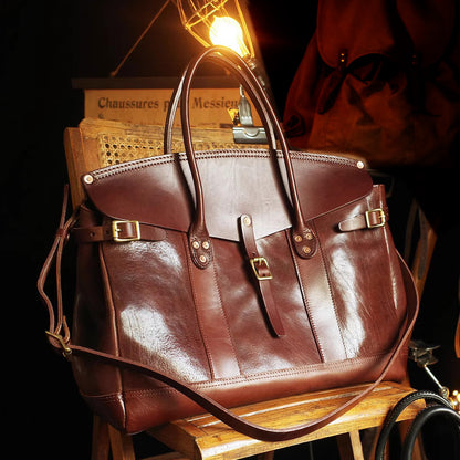 Stylish Italian Leather Travel Bag, perfect for laptops and weekend trips, showcasing premium craftsmanship and a rich brown finish.