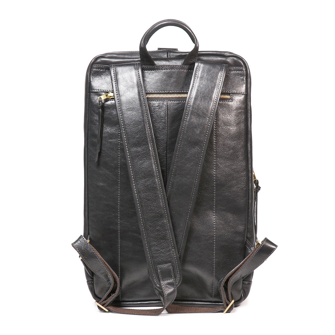 Back view of i7Bags Executive 18-inch full-grain leather laptop backpack showing padded straps and a hidden security pocket.