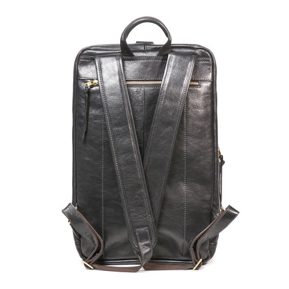 Back view of i7Bags Executive 18-inch full-grain leather laptop backpack showing padded straps and a hidden security pocket.