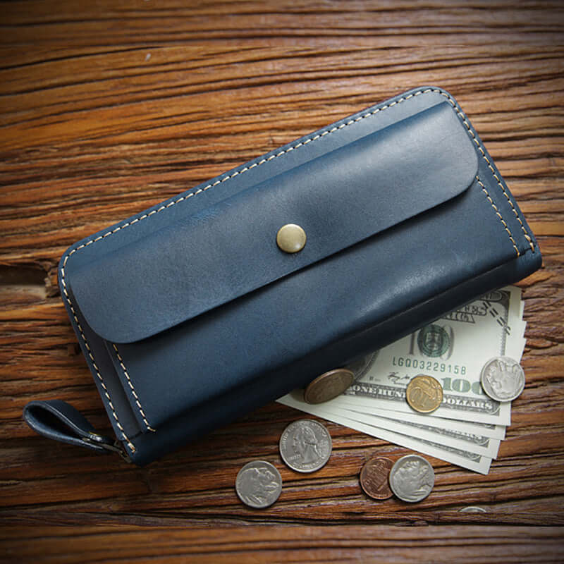 Full Grain Leather Zip Around Wallet Card Holder Phone Organizer with cash and coins on a wooden surface.