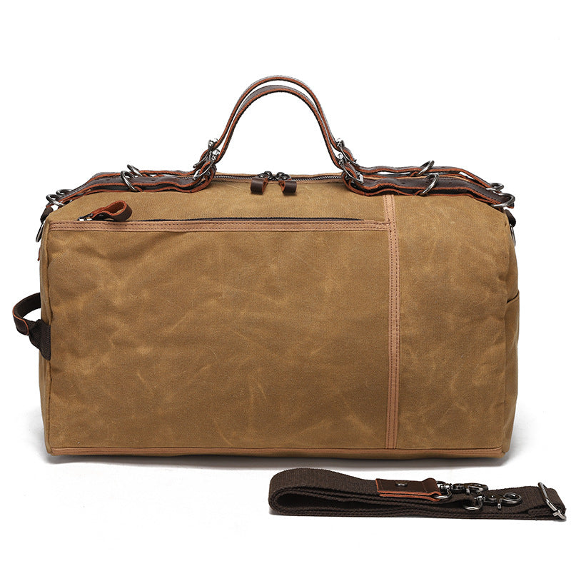 Waxed Canvas Leather Travel Bag Vintage Duffel Shoulder Bag 19.7in in brown with adjustable shoulder strap.