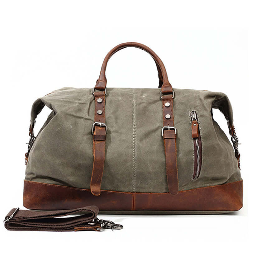 Large Waxed Canvas Travel Duffel Bag Leather Travel Duffle Luggage in army green with adjustable shoulder strap.