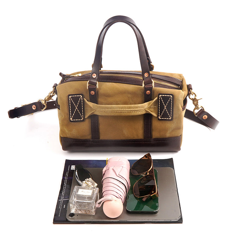 Handmade Canvas Leather Crossbody Bag Women with sunglasses and accessories laid out, showcasing versatility and style.