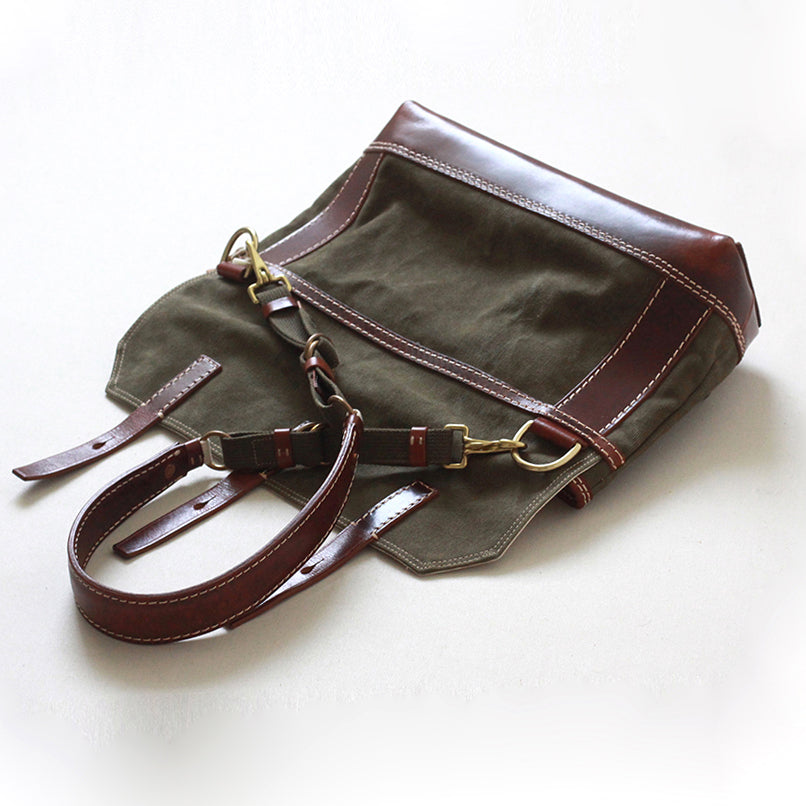 Canvas Leather Messenger Bag in green and brown, showing adjustable straps and vintage flap design.