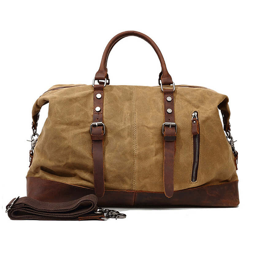 Large Waxed Canvas Travel Duffel Bag Leather Travel Duffle Luggage in khaki with brown leather accents.