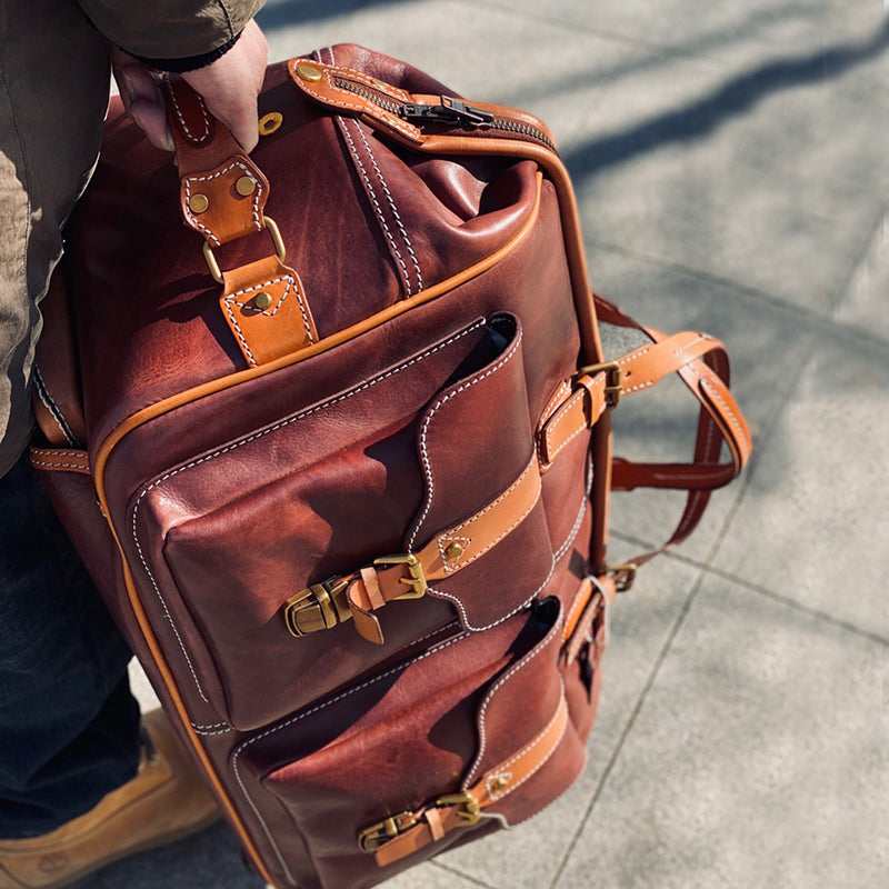 Handmade Leather Travel Bag With Wheels, brown duffel bag with buckles, perfect for travel, 23.6 in carry on.